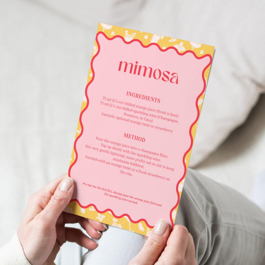 Drink recipe cards printable set displayed as home bar wall art